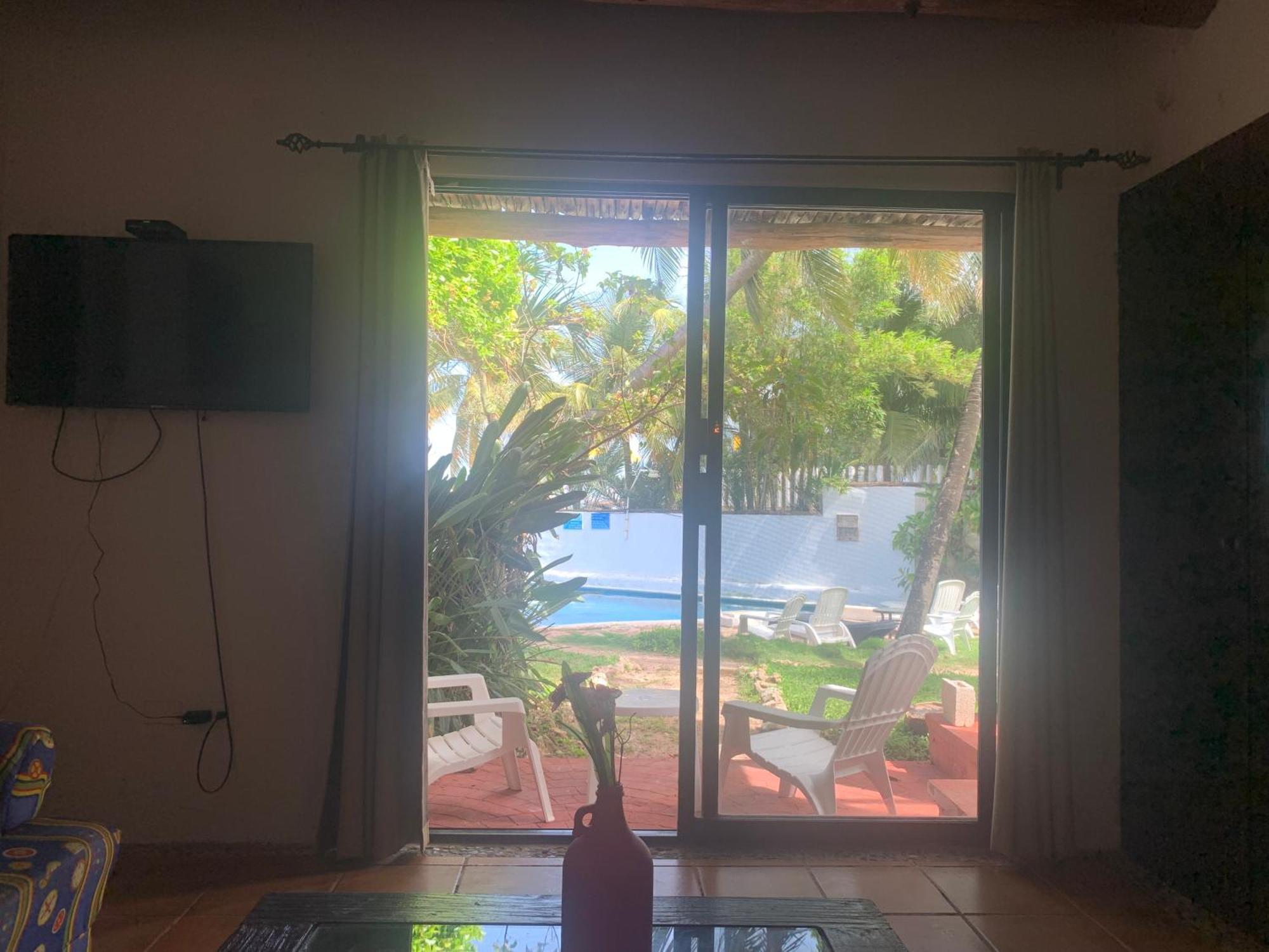 Casa Caribe Cancun Luaran gambar A view of the pool from the living room